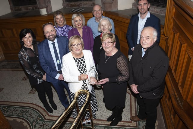 Carmel Dunn, former Principal of Hollybush PS pictured with members of the board of governors and staff from the school during Wednesday’s Mayoral Reception in the Guildhall.
