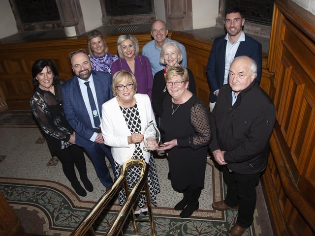 Carmel Dunn, former Principal of Hollybush PS pictured with members of the board of governors and staff from the school during Wednesday’s Mayoral Reception in the Guildhall.
