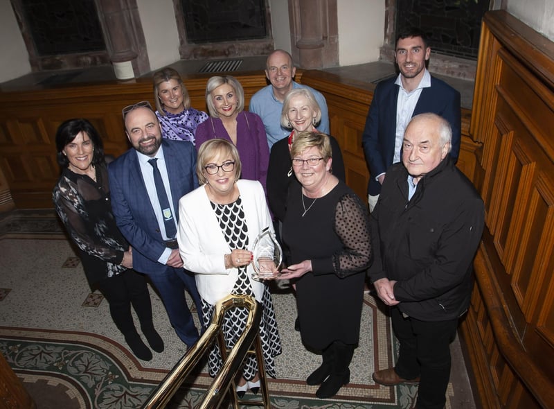 Carmel Dunn, former Principal of Hollybush PS pictured with members of the board of governors and staff from the school during Wednesday’s Mayoral Reception in the Guildhall.