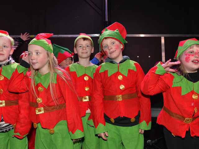 Pupils from Hollybush Primary School sing Christmas carols at the Culmore Community Hub on Friday night. Photo: George Sweeney