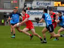 Dublin pair Cormac Costello and Eoin Murchan close in on Derry’s Padraig McGrogan during the Allianz Football League in Celtic Park. Photo: George Sweeney. DER2309GS – 44