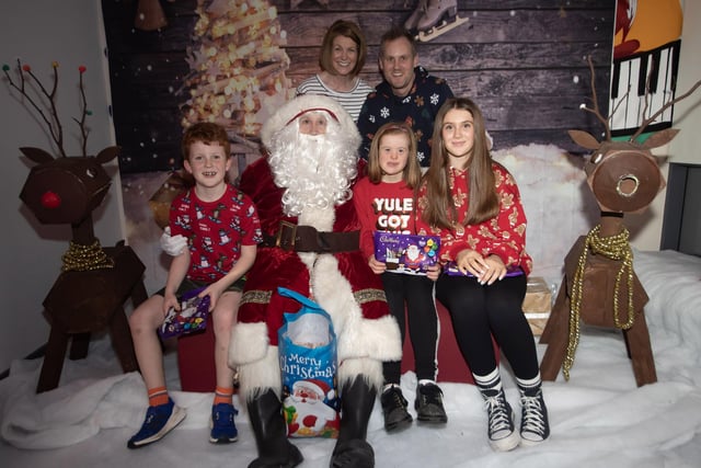 Santa has a visit from Team Sandy during the Foyle Down Syndrome Trust's Annual Christmas Night Out on Monday.
