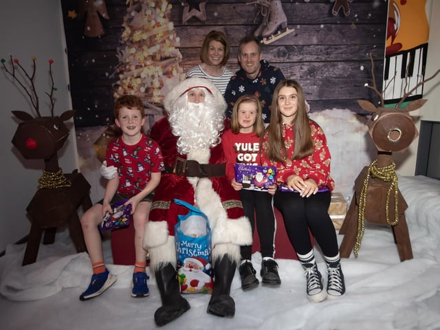 Santa has a visit from Team Sandy during the Foyle Down Syndrome Trust's Annual Christmas Night Out on Monday.