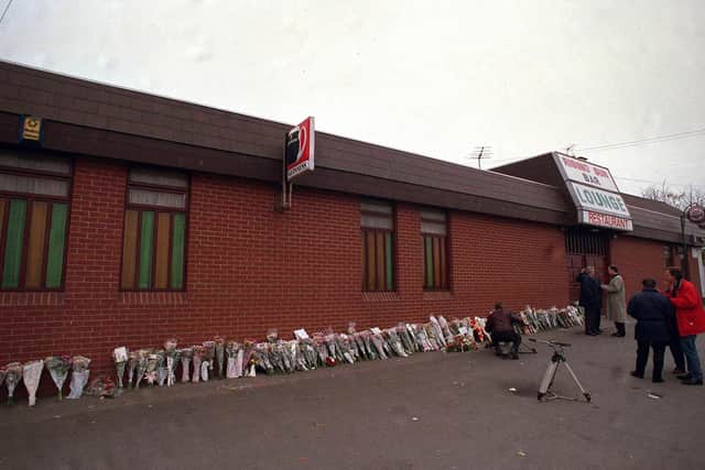 Flowers left outside the Rising Sun bar after the Greysteel attack.