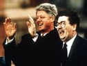 PACEMAKER BELFAST 10/02/98 US President Bill Clinton pictured in Derry with the local MP John Hume during his one day visit to the province in 1995.