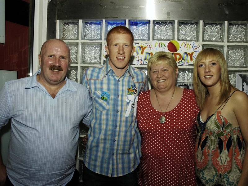 Eugene pictured celebrating his birthday with dad Eugene, mum Lorraine and sister Elaine. : .
