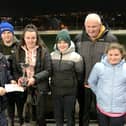 The Talbot Family receiving the Greyhound Data Trophy. From left; Barry Holland, Rian, Ceallach, Shane, Matthew and Grace Talbot.