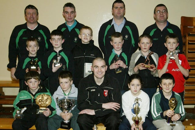 Top of the Hill Celtic under age award recipients pictured with Sean Hargan of Derry City when he was a guest at their presentation evening.  Included in photo are club coaches Paul Miller, Keith Roddy (Chairman), Eamonn McLaughlin and Paddy Logue.  (1402JB62)