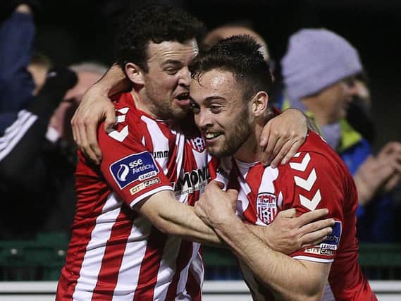 GOAL HEROES . . . Barry McNamee and Nathan Boyle celebrate Derry City's first win over Dundalk in four years.