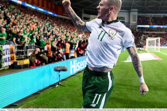 BRING THEM ON! James McClean celebrates scoring the winning goal in the Group D clash against Wales at the Cardiff City Stadium.