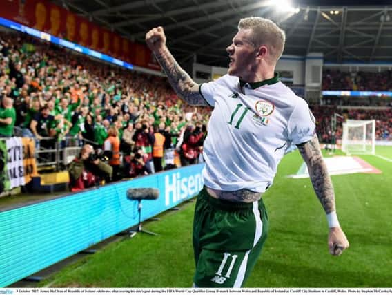 BRING THEM ON! James McClean celebrates scoring the winning goal in the Group D clash against Wales at the Cardiff City Stadium.