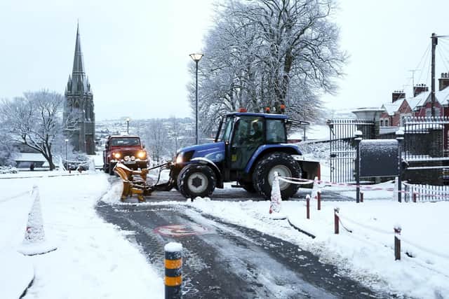 A snow plough clearing pathways in Brooke Park on Wednesday morning.