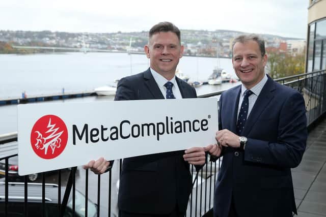 Robbie O'Brien, C.E.O. MetaCompliance and Invest NI Executive Director of Business and Sector Development, Jeremy Fitch.