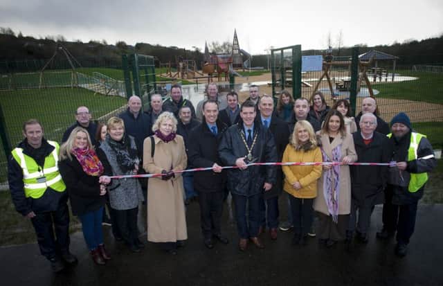 The Deputy Mayor, Councillor John Boyle, cutting the ribbon at the official launch of the new Play Area at Ballyarnett Country Park on Monday morning.