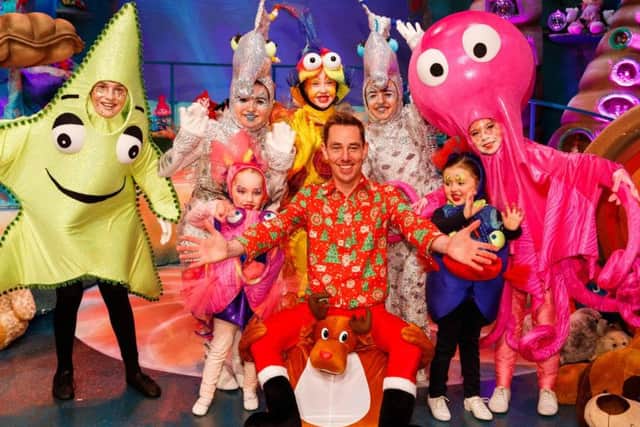 The Late Late Toy Show host, Ryan Tubridy, pictured with some of the children who will be appearing in this year's live show on Friday December 1. (Photo: Andres Poveda/Andres Poveda Photography)