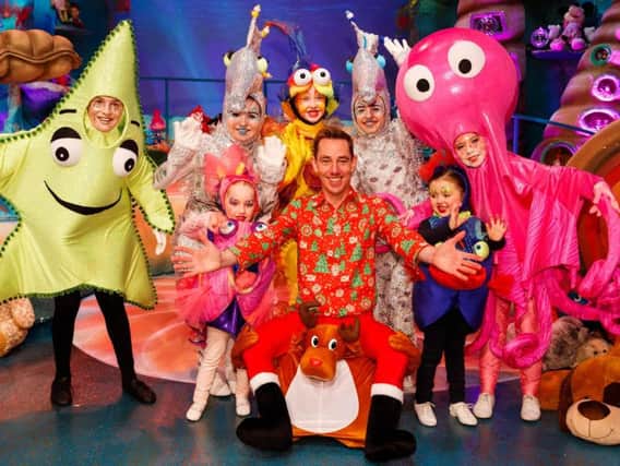 The Late Late Toy Show host, Ryan Tubridy, pictured with some of the children who will be appearing in this year's live show on Friday December 1. (Photo: Andres Poveda/Andres Poveda Photography)