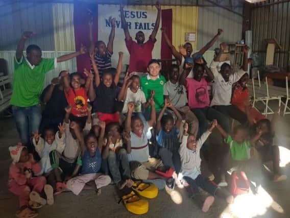 Belfast boxer, Carl Frampton, pictured during a visit to the Mukuru Boxing Club in Nairobi, Kenya. (Photo: MTK Global/Twitter)