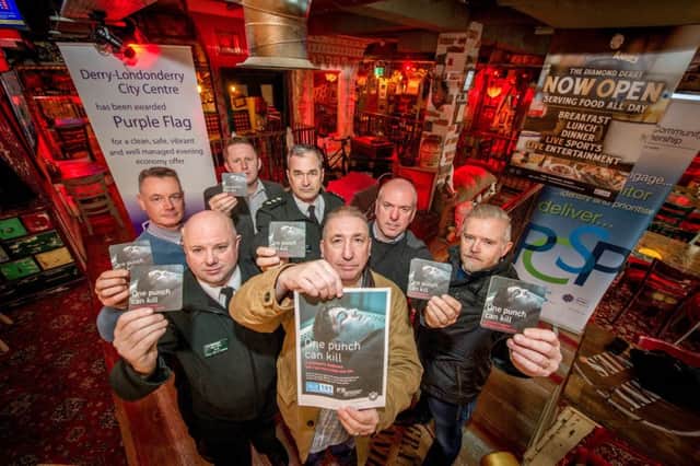 Representatives from the PSNI, the Police and Community Safety Partnership and Granny Annies Bar at the launch of the One punch can Kill:  A moments madness will ruin more than one life beer mat and poster awareness campaign which will be rolled out across the City and District this weekend. More information is available by calling the police and asking for your Crime Prevention Officer or Local Policing Team or by contacting the PSCP through Derry City and Strabane District Council.