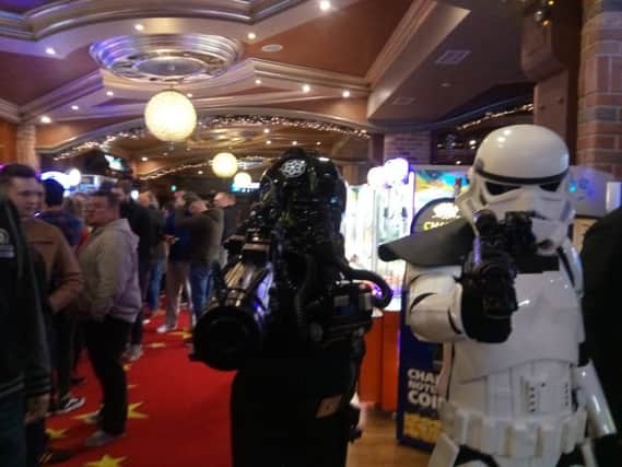 The Emerald Garrison troopers patrolling  the queues for Star Wars The Last Jedi at Brusnwick in Derry.