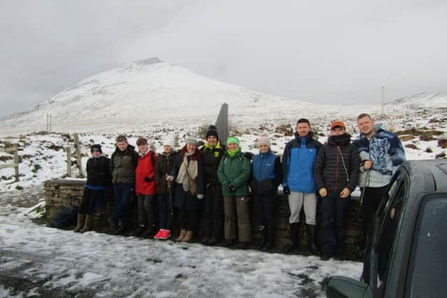 The group pictured before their ascent.