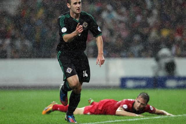 Tyrone native McGinn has more than 50 caps for Northern Ireland.