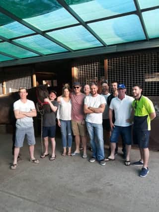 From left with the horse, Davy Moore from Derry, Kieran McDonagh, trainer,  Michelle Keogh from Derry, Shaun Keogh from Derry, John Patton from Derry, Damien O Connor, Steve Sturbridge from Kerry, Olan Healy from Cork, Stephen O'Neill from Derry and Kieran Cremins from Cork.