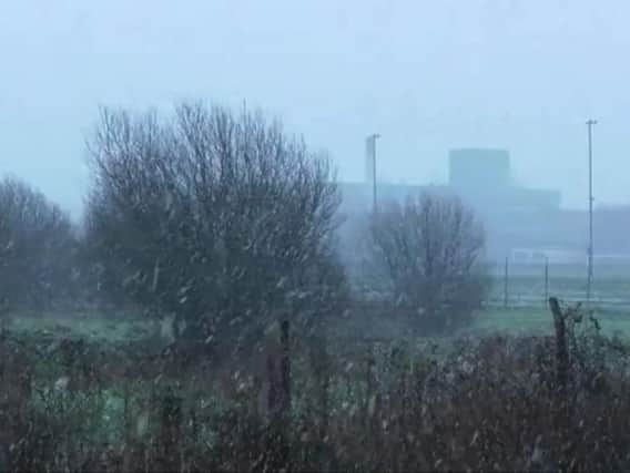 A heavy snow shower near the Buncrana Road in Derry on Tuesday afternoon.