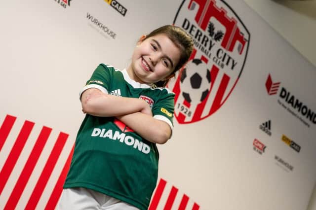 Paris Armour, daughter of Wurkhouse CEO Troy Armour, practises her football skills to help celebrate the new three-year sponsorship deal with Derry City F.C. and the local creative agency this week.