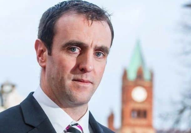 Mark H Durkan.