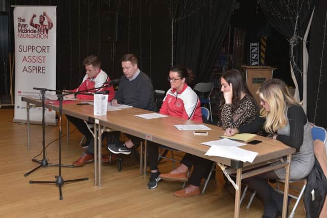 Conor Loughery, Gareth McCay, Mairead McKenna, and Colleen McBride  and Caitlin McBride, members The Ryan McBride Foundation, pictured at a public meeting about the renaming of Brandywell Stadium in the Gasyard Centre on Wednesday evening last. DER0318GS004
