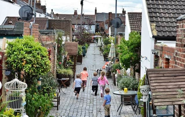 REGENERATION... This laneway in the North East of England was transformed by local householders.