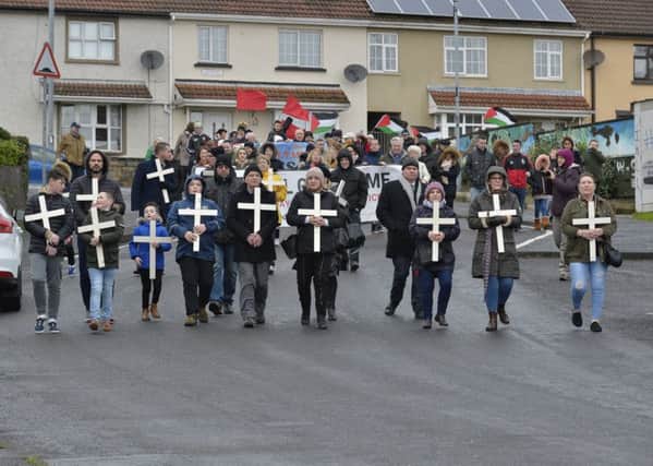 Relatives leading the 46th Bloody Sunday anniversary march and rally on Sunday afternoon last. DER0518GS003