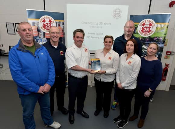 Pictured at the launch of Foyle Search & Rescue 25th Anniversary Calendar of Events at Prehen on Wednesday evening last are James Kealey, Pat Carlin, Stephen Twells, Racheal Dobbins, Dougie McGhee, Christina McKeegan and Heather McGhee. The events will run from February through to December this year. DER0518GS046