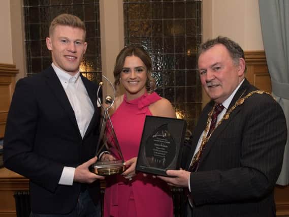Mayor of Derry City and Strabane District Council, Councillor Maolosa McHugh with James McClean and wife Erin at the VIP Reception in the Guildhall to mark his win in the RTE Sports Personality of the Year 2017.