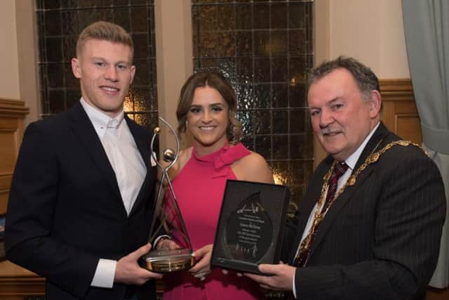 Mayor of Derry City and Strabane District Council, Councillor Maolosa McHugh with James McClean and wife Erin at the VIP Reception in the Guildhall to mark his win in the RTE Sports Personality of the Year 2017.
