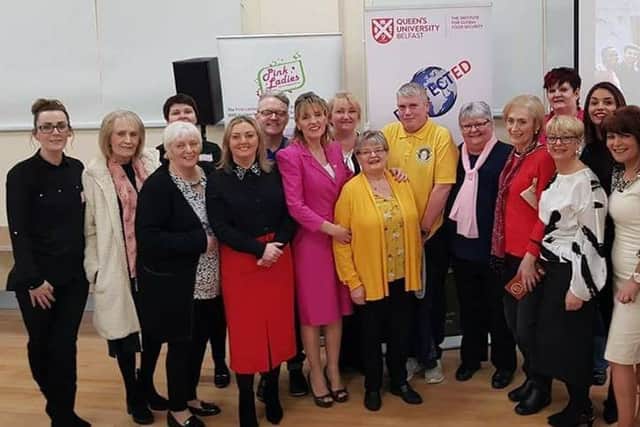 Representatives from the Pink Ladies and Pink Panthers joined by other cancer focus and health representatives and research experts at the event in Derry.