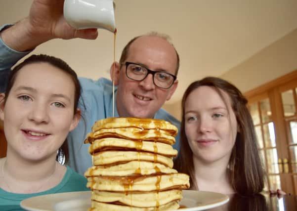 Brian McDermott shares his classic pancakes with daughters Niamh and Aoife.