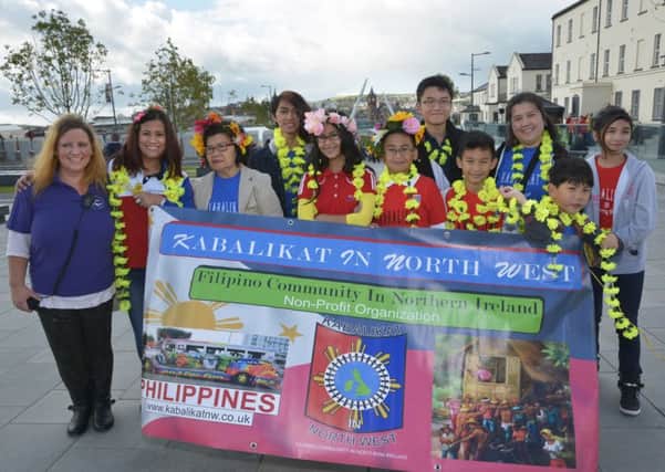 Members of Kabalikat in North West, representing local members of the Filipino Community, at an event in Ebrington in 2014.