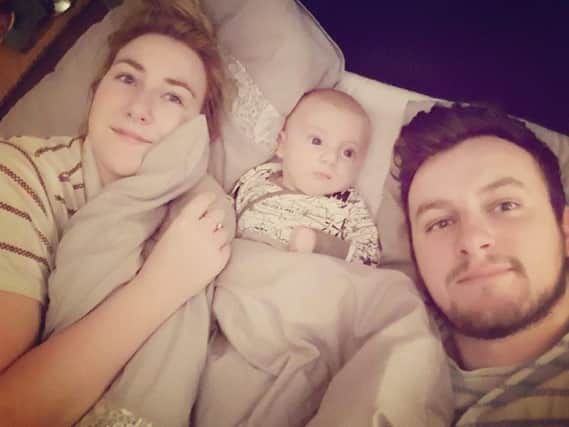 Derry singer-songwriter Conor McGinty with fiancee Aisling and son DÃ¡ire.