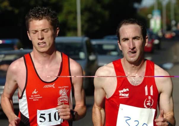 The Spartans' Aaron Doherty (right) travels from Madrid to defend his NI & Ulster senior cross country championships title while teammate, Emmett McGinty will be hoping to help City of Derry clinch the team title.
