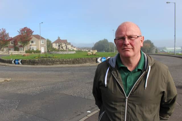 Sinn Fein Councillor Kevin Campbell pictured at Iniscarn Road.