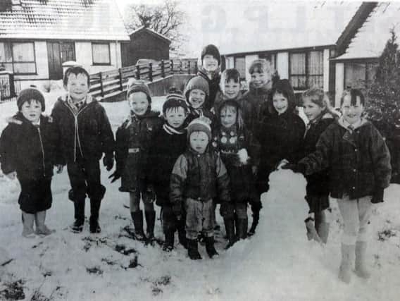 Children from Springvale Park enjoying the first snow of winter in 1989. (Photo: Derry Journal)