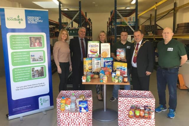 The Mayor with representatives from the Foobank at the launch of the Christmas Foodbank Drive.