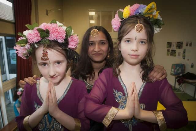 Ashwini Shivashankar, facilitator, pictured with Broadbridge Primary School pupils Chloe OÃ¢Â¬"Donnell and Leah Bryson, who will take part in this yearÃ¢Â¬"s St. PatrickÃ¢Â¬"s Day Celebrations in the city when their theme will be the Hindu bee goddess Bhramari.