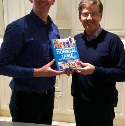 Brian and Daniel pictured with Brian's new book.