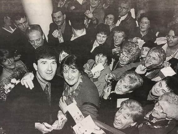 Autograph hunters mob popular singer Daniel O'Donnell during a visit to Derry in 1999.