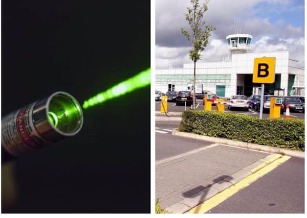 A laser was shone at an aircraft landing at City of Derry Airport, police have said.