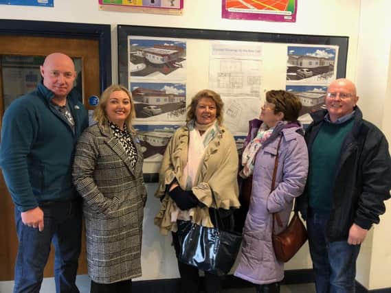 L- R Stevie Mallet, Manager of Mary's Youth Club, Sinn Fein Education spokesperson Karen Mullan MLA, Colr Patricia Logue, Kathleen Doherty, Chairperson and Colr Kevin Campbell looking at plans for the new youth club