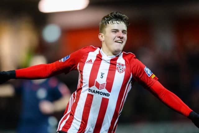 GOAL HERO . ..  Ronan Hale netted a hat-trick as Derry City made a winning return to Brandywell.