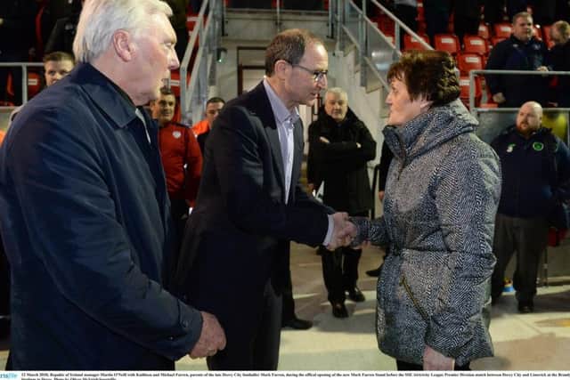 Repubic of Ireland manager Martin O'Neill with Kathleen and Michael Farren, parents of the late Derry City footballer Mark Farren, during the offical opening of the new Mark Farren Stand before the SSE Airtricity League Premier Division match between Derry City and Limerick at the Brandywell Stadium in Derry.